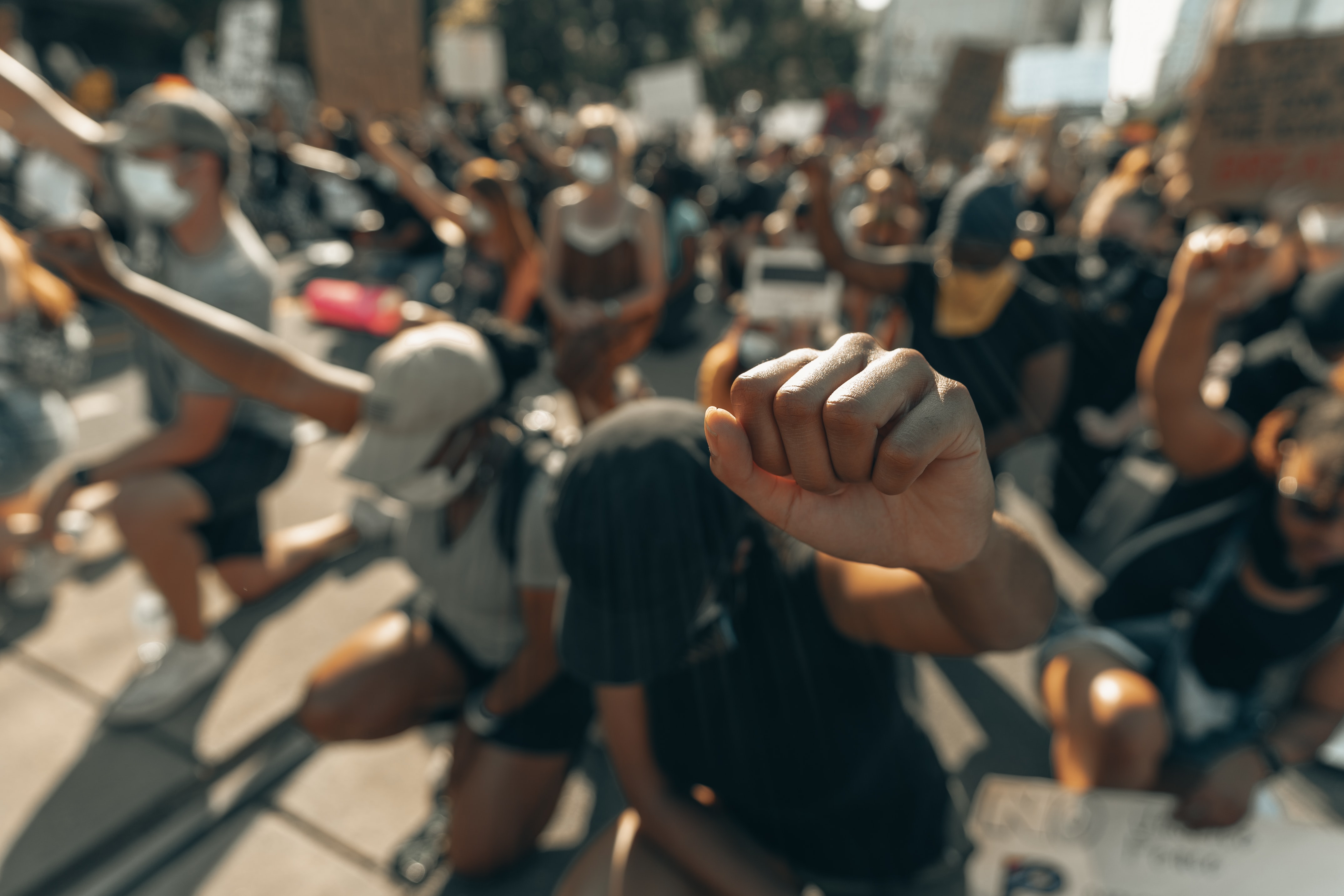 A fist raised in solidarity (social justice photo)